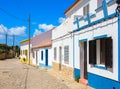 Street with typical Portuguese white houses in Sagres, southern Algarve of Portugal Royalty Free Stock Photo