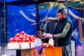 Street vendor selling pomegranate juice