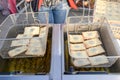 Street vendor while he is cooking the tasty pancakes Royalty Free Stock Photo