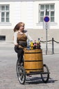 Street vendor girl cycling Royalty Free Stock Photo