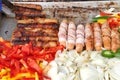 Street vendor grill with hot dogs and veggies