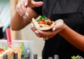 Street vendor hands making taco outdoors Royalty Free Stock Photo