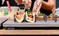 Street vendor hands making taco outdoors Royalty Free Stock Photo