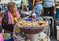 Street vendor, roasted casava and banana