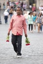 Street vendor of roses for tourists