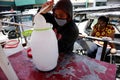 Street vendor sell coconut juice to earn money during the lockdown due to Covid 19 virus outbreak