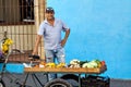 Street vendor selling fruit and vegetables on his bike in the streets of Camaguey, Cuba Royalty Free Stock Photo