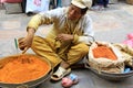 A street vendor selling ground herbs in Kathmandu