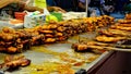 Street vendor selling local Thai food grilled chicken at Pattaya Thailand