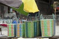 Street vendor selling straw hats and handbags Royalty Free Stock Photo