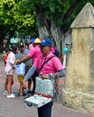 Street vendor sells rosaries and Larimar gem stones in Santo Domingo