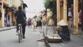 Street vendor on sidewalk, Hoi An, Vietnam Royalty Free Stock Photo