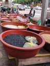 Street Vendor Selling Beans and Grains