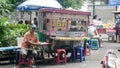 Street vendor waiting for a buyer at Bungkul Park Surabaya 07