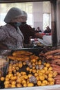 Street vendors cooking Colombian potatoes
