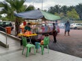 Street vendors and hawkers sell local goods and food to the public.