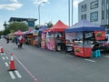 Street vendors and hawkers sell local goods and food to the public on-street by opened a small stall.