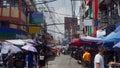 Street vendors occupy a sizable portion of both sides of the road