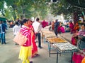 Street vendors sell oil lamps for buddhist religious ceremonies in front of Mahabodhi temple complex