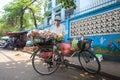 Street Vendors selling foods girdle mix cake . Street vendors are very common in the street