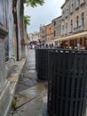 A street or street in Venice with garbage bins in the foreground.