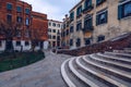 Street in Venice, Italy. Narrow street among old colorful brick houses in Venice, Italy. Venice postcard Royalty Free Stock Photo