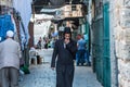 Street view of Al-Wad street in the old city of Jerusalem, Israel with Orthodox Jewish walking in the street Royalty Free Stock Photo