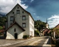 Street view of alpine village showing three chapels