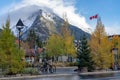 Banff Avenue in autumn and winter snowy season. Snow Capped Mount Rundle in the background. Royalty Free Stock Photo