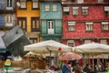 Street view on the beautiful old buildings with portuguese tiles on the Ribeira square in Porto city