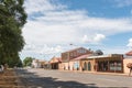 Street view, with businesses, people and vehicles, in Glencoe