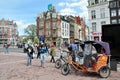 Street view on the busy Muntplein square, Amsterdam, the Netherlands Royalty Free Stock Photo