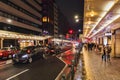 Street view with busy traffic, downtown of Kyoto, Japan, at night