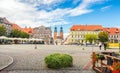 Street view in the city center and Cathedral Basilica of the Assumption of Blessed Virgin Mary and St. Adalbert: Gniezno / Poland