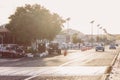 Street view in city Egypt sunset. Large car flow. Asphalt street with lanterns on which solar panels are installed Royalty Free Stock Photo