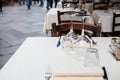 Street view of a coffee terrace with tables and chairs Royalty Free Stock Photo