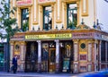 Street view of Crown Bar, famous pub at great victorial street Belfast.