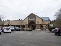 Lynnwood, WA USA - circa March 2022: Street view of the exterior of a Rite Aid Pharmacy on a cloudy, overcast day