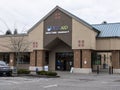 Lynnwood, WA USA - circa March 2022: Street view of the exterior of a Rite Aid Pharmacy on a cloudy, overcast day