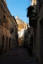 The street view on the famous Mosta Rotunda of Saint Maria Assunta in Maltese city Mosta