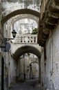 street view with flower pots in Apulia region.