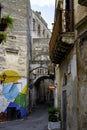 street view with flower pots in Apulia region.