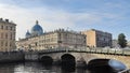 Historic view in Saint Petersburg with a church, buildings, bridge and river