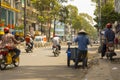 Street view of Ho Chi Minh with unidentified local Vietnamese people commute on the road in Ho Chi Minh City, Vietnam Royalty Free Stock Photo