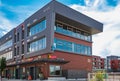 Street view of the modern shops downtown Langley BC. Cityscape office buildings with modern corporate architecture