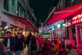 Street view at night and people eating, drinking outdoor in Utrecht, Netherlands Royalty Free Stock Photo