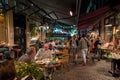 Street view at night and people eating, drinking outdoor in Utrecht, Netherlands Royalty Free Stock Photo