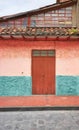 Street view of an old colonial building facade, Cuenca, Ecuador Royalty Free Stock Photo