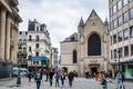 Street view of old downtown with lots of people walking at the street of Brussels, Belgium