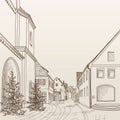 Street view in old european city. Retro cityscape - houses, buildings, tree on alleyway. Royalty Free Stock Photo